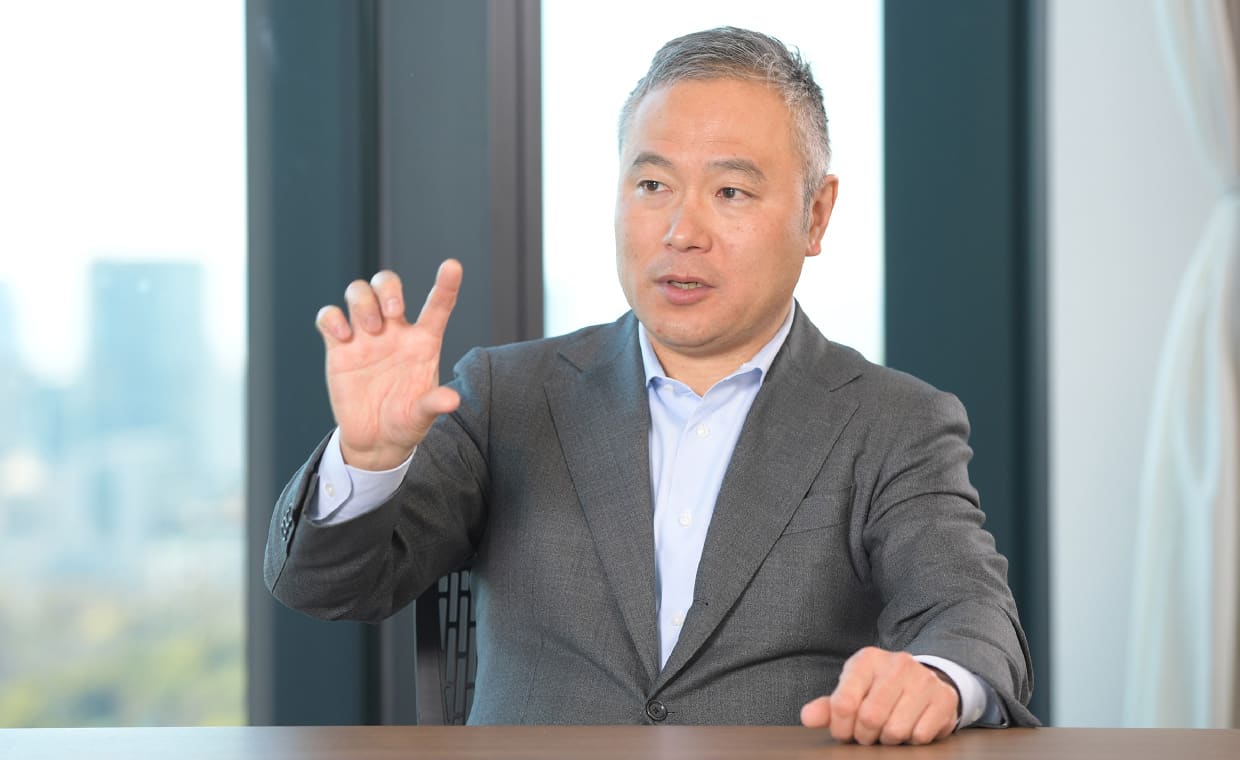 角田 真一氏